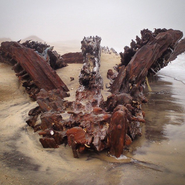 Rusted and weathered remains of the Kohler shipwreck exposed on an Outer Banks beach in 2015