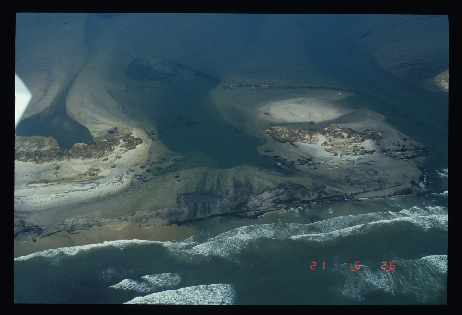 Aerial photo of the inlet Hurricane Isabel cut through Hatteras Island between Frisco and Hatteras village, three days after the storm